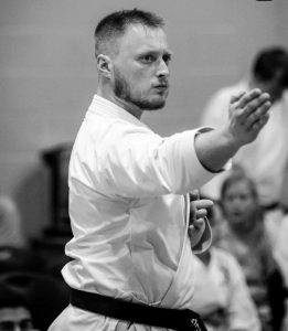 Sensei Will Moy focused in a kata Competition representing SESMA Martial Arts Norwich in Karate